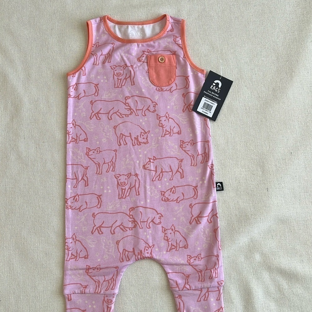 NEW RAGS Sleeveless Pink Capri
Romper with Pigs